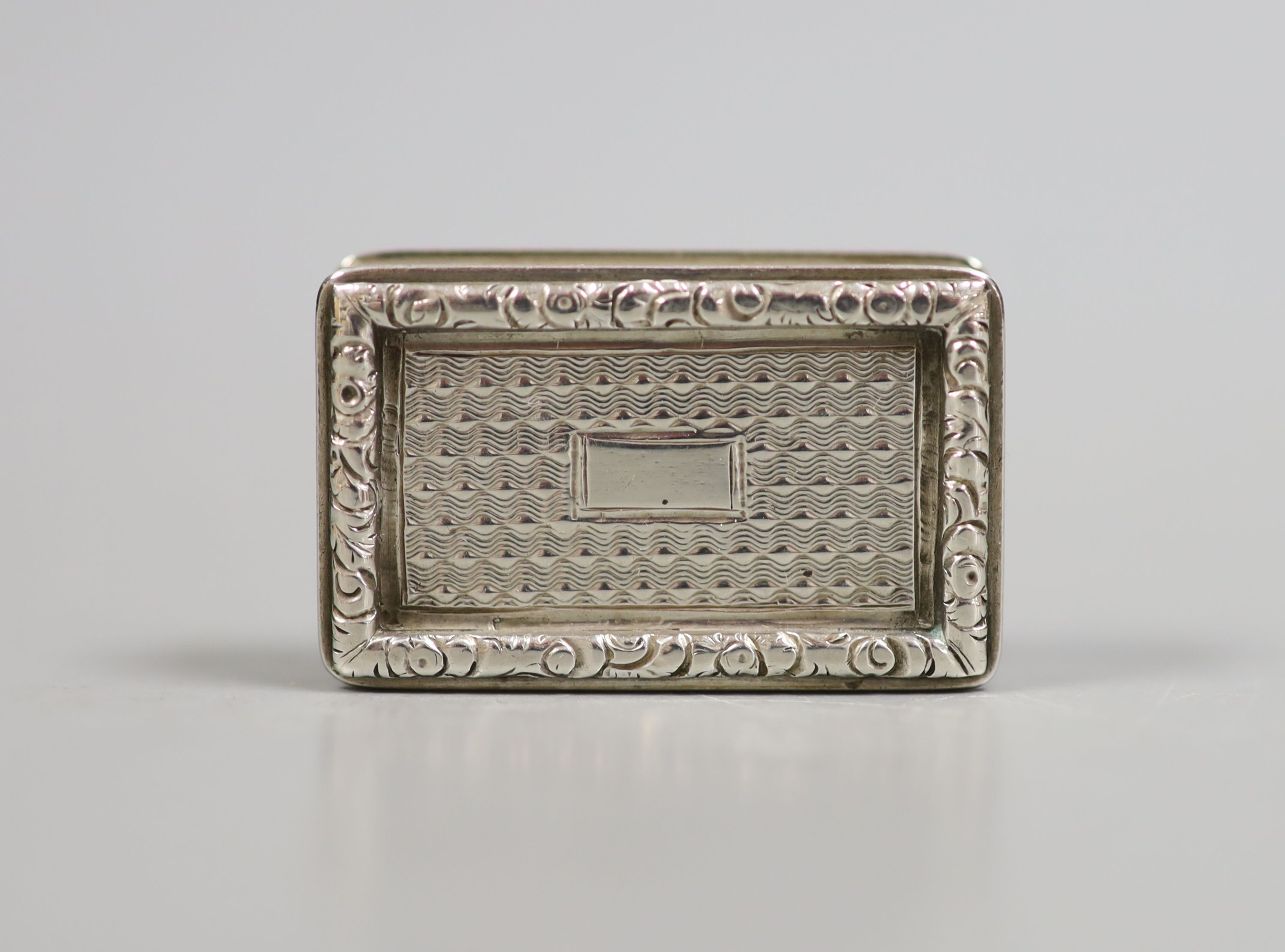 An early Victorian silver rectangular vinaigrette, Jesse Sargeant, Birmingham, 1838, 33mm.